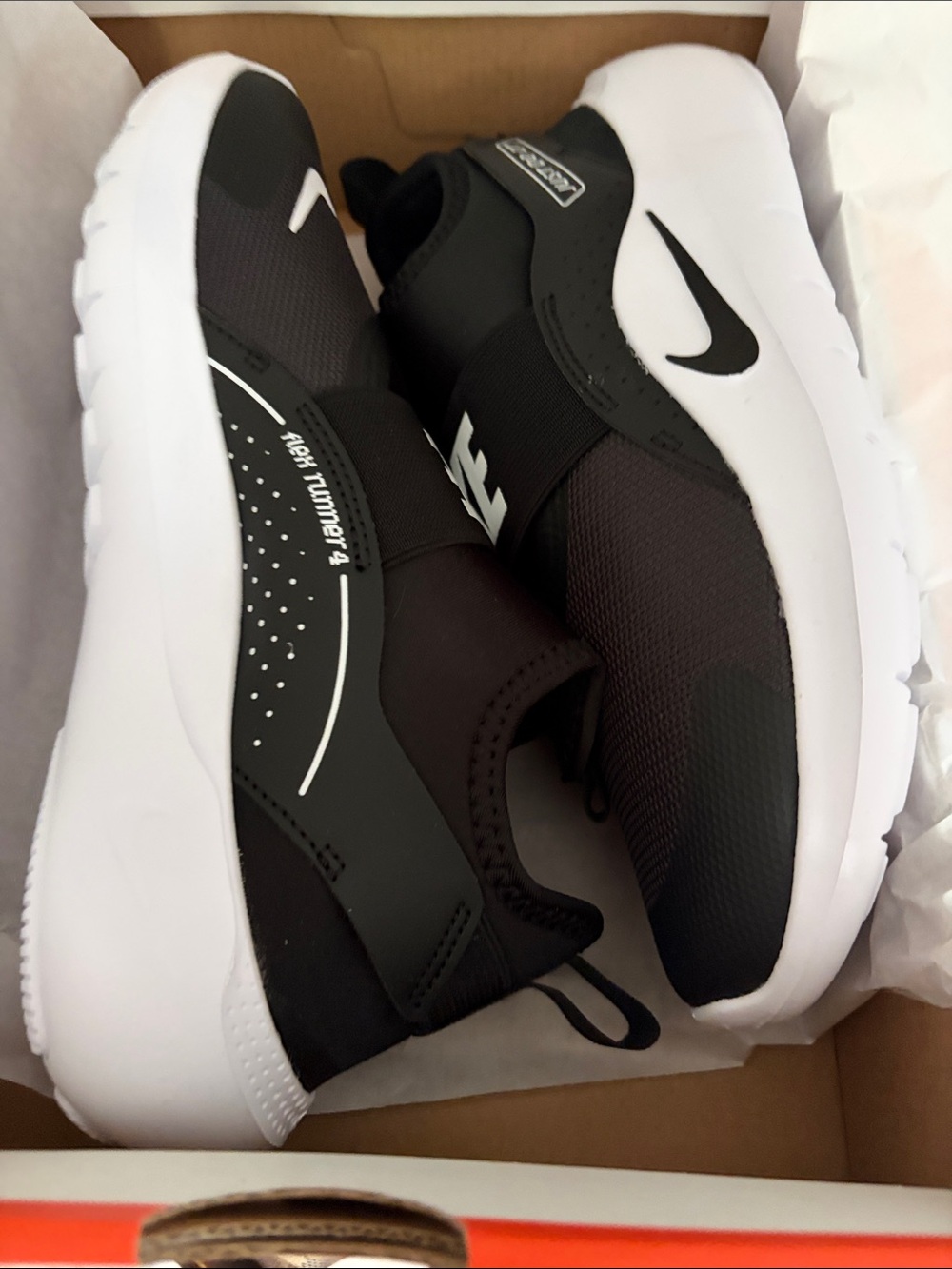 Nike Kids Black and White Slip-On Sneakers